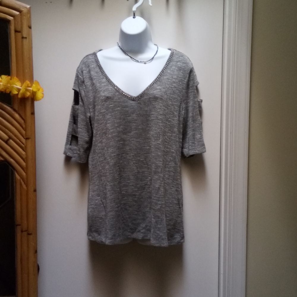 Jennifer López silver shimmer top